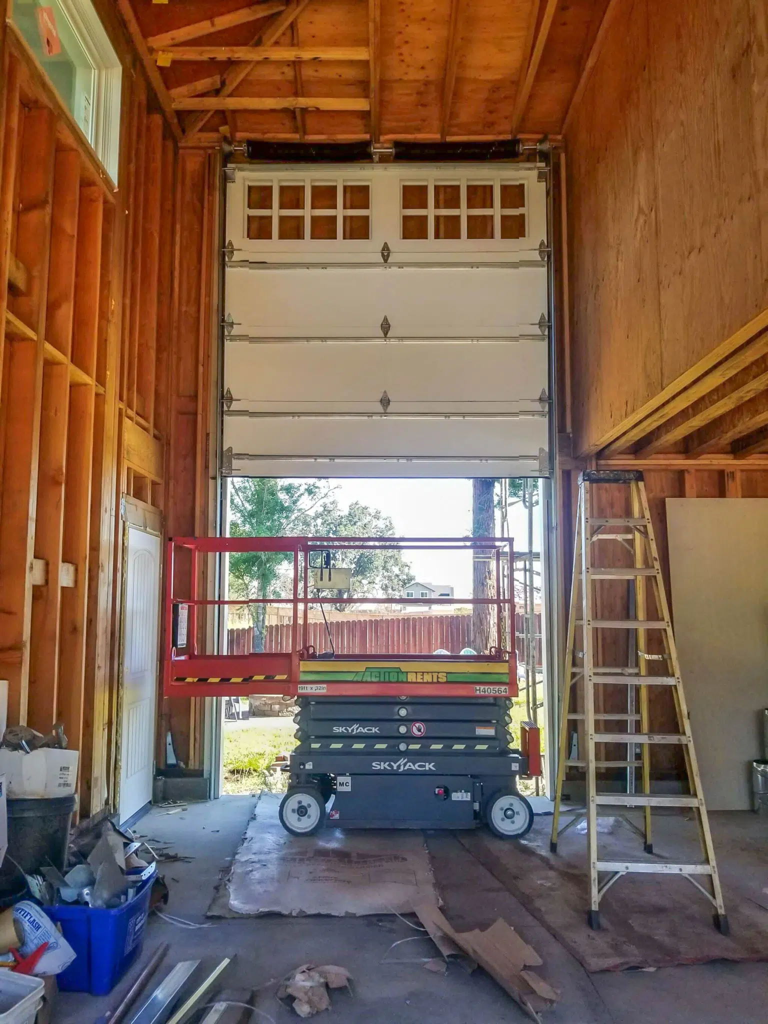 Vertical lift garage door track installed