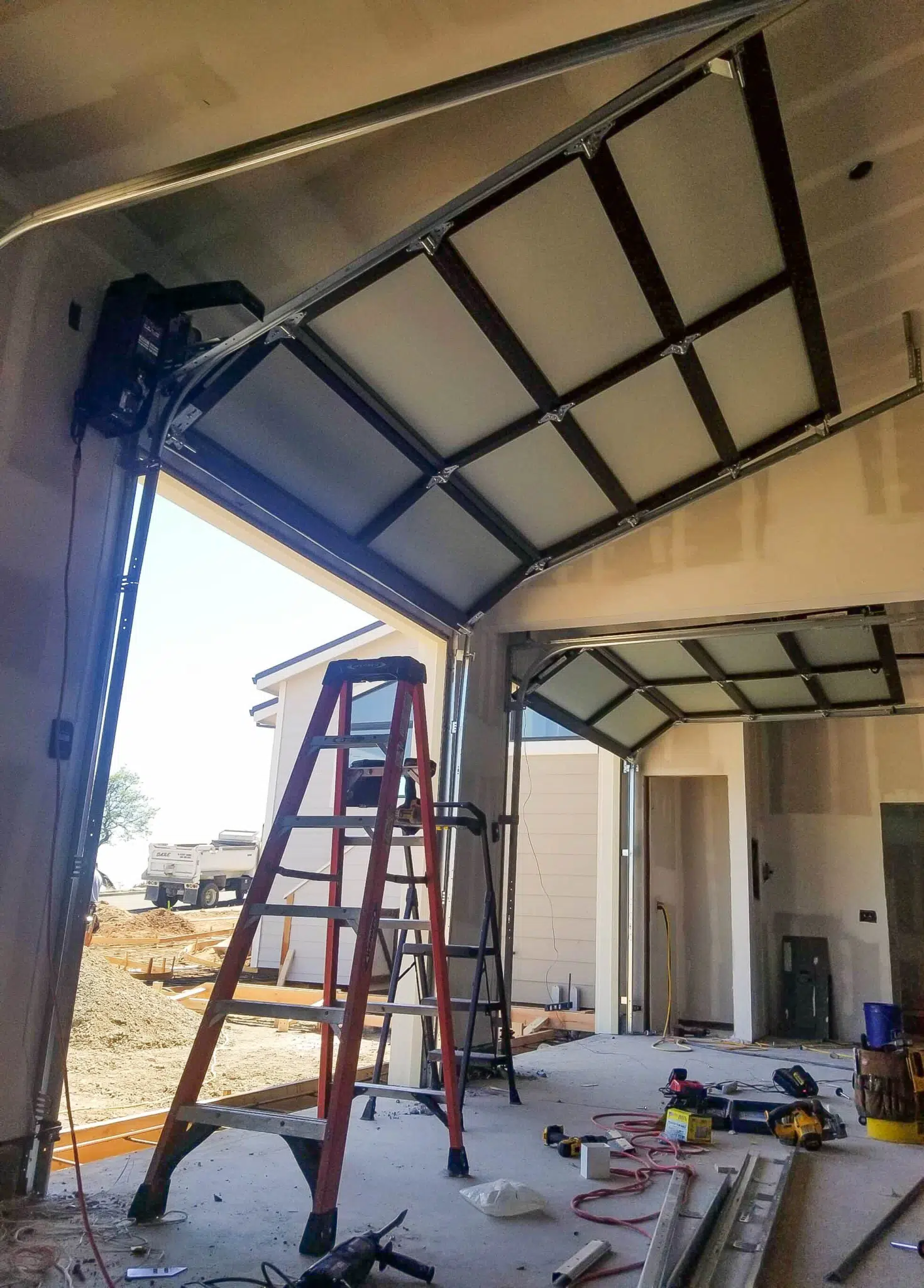 Pitch angle garage door track installed
