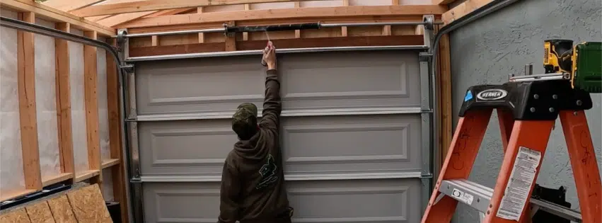 Dustin Cantu performing professional garage door maintenance service in Contra Costa County — Generational Garage Doors