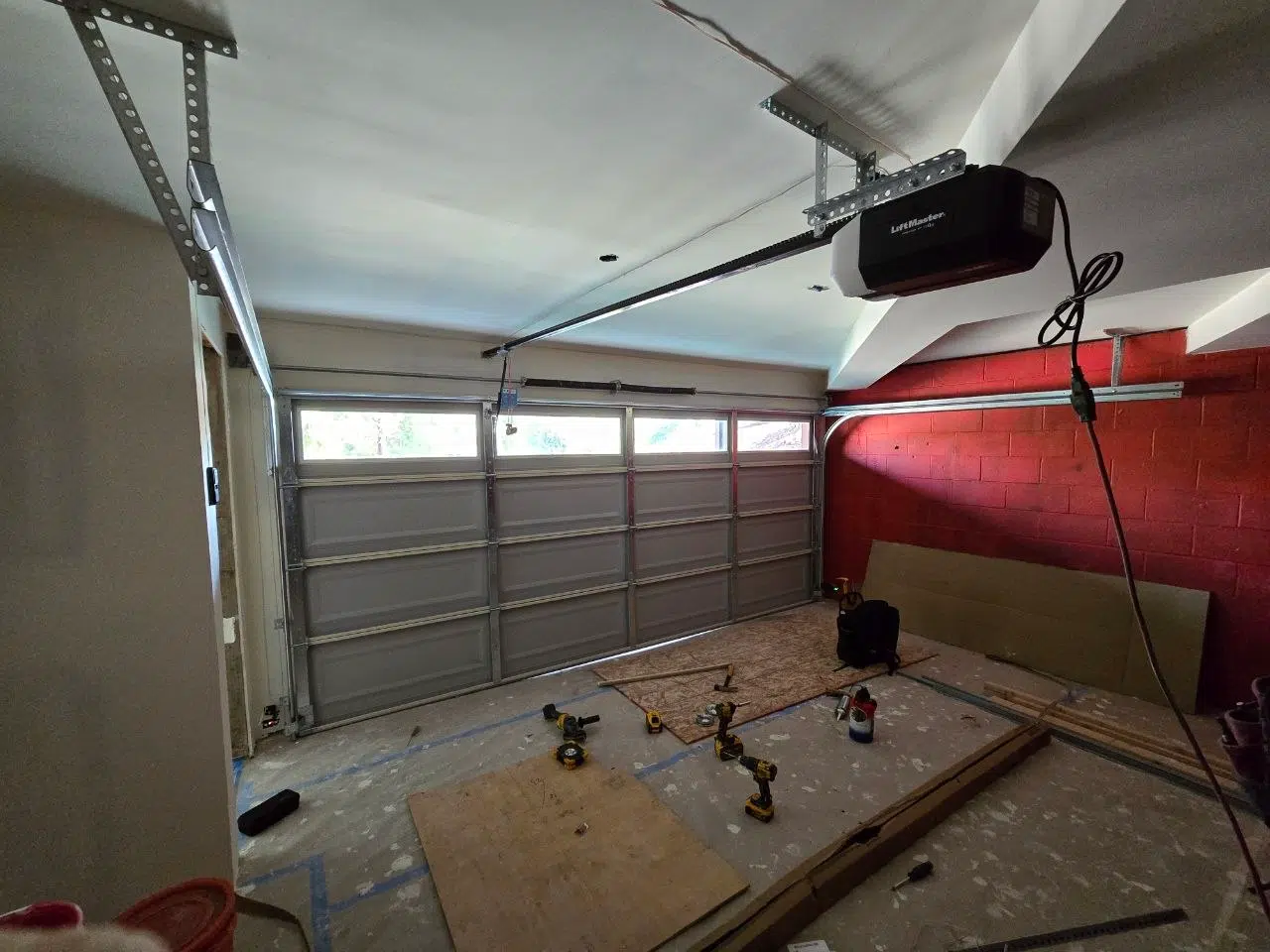 Low headroom garage door track installed