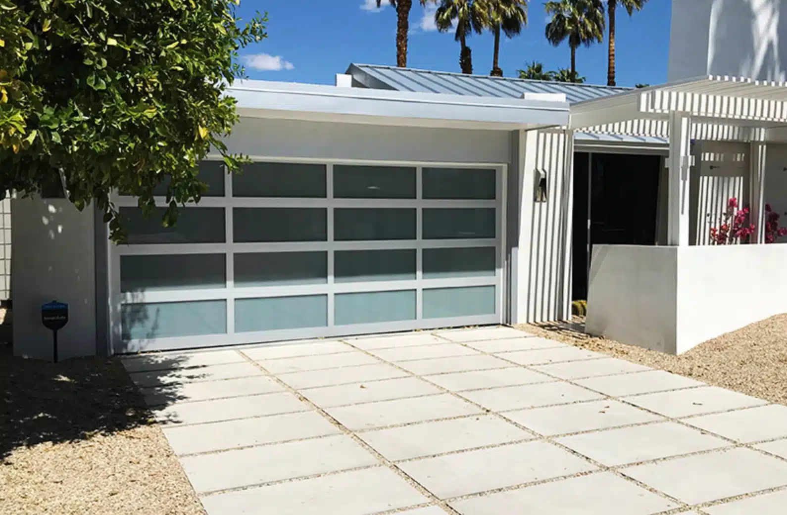 Alumadoor full-view glass garage door with clear anodized aluminum frame
