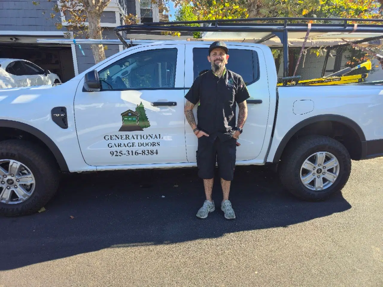 Dustin Cantu, owner of Generational Garage Doors, with the work truck